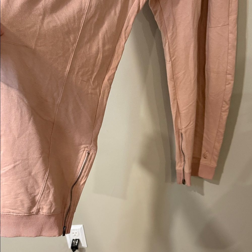 Free People movement dusty rose colored joggers with ankle zip and drawstring - Picture 8 of 13